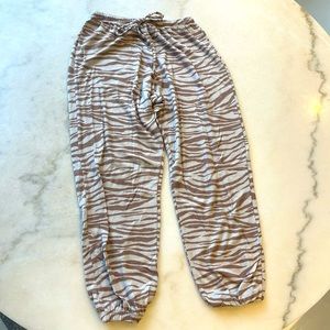 Onzie elastic band sweatpants with drawstring  tan zebra print. S